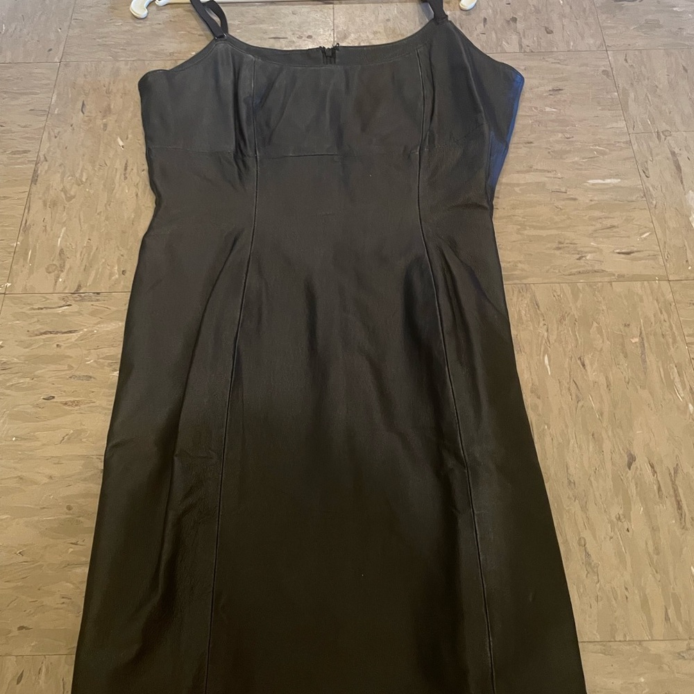 Woman leather mini dress with straps back zipper